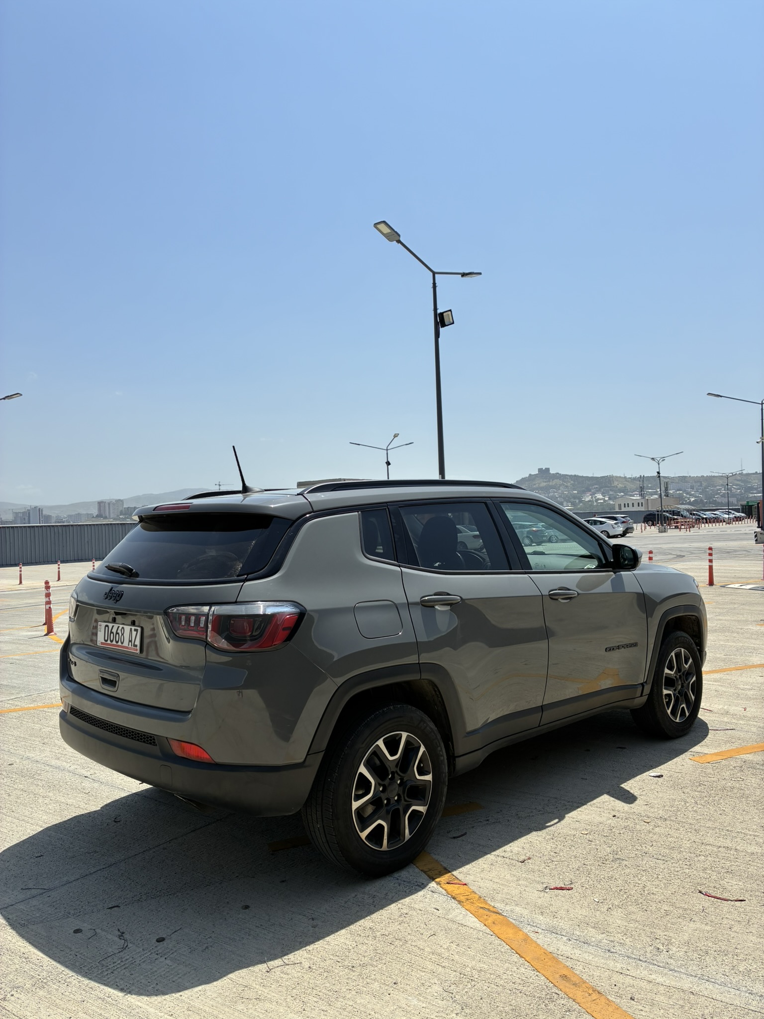 rent a car tbilisi Jeep Compass 4x4 – All-Weather Mountain SUV